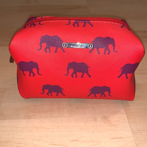 Stella & Dot Handbags - STELLA & DOT Elephant pattern zip pouch pouf